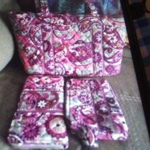 Vera Bradley handbag. Size is medium to large.and is a plum color
